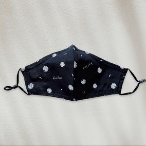kiwi beast white daisy black adjustable strap adult face mask